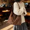 Bolso de nicho coreano para mujer 2026 nuevo otoño e invierno vintage estampado de leopardo bolso de hombro versátil moda bolso tote para la ciudad