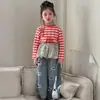 Conjunto de Tres Piezas para Niñas Estilo Coreano Primavera Nuevo Top Rayado de Dibujos Animados Falda con Estampado de Leopardo Jeans Casuales 2026