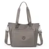 Bolsa de Ombro Feminina 2025 Novo Modelo Grande Capacidade Casual Versátil Texturizada Nylon Tecido Oxford Bolsa de Mão Bolsa Transversal para Mulheres