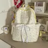 Mochila floral branca leitosa para mulheres, bolsa escolar de nicho ins para meninas, mochila com acabamento em renda, mochila versátil para ensino fundamental II, ensino médio e deslocamento