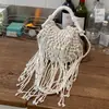 Bolso tejido para mujer, nuevo modelo de verano 2026, nicho y súper popular, bolso de hombro para el trabajo, bolso cruzado con borlas, bolso de playa de paja