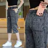 Pantalones cortos de verano 2026 para hombre nuevos finos transpirables casuales shorts modernos únicos versátiles de pierna recta longitud media pantalones