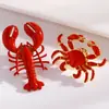 Broche de aleación estilo vacacional transfronterizo europeo y americano en la playa y el océano, personalizado con goteo de aceite de langosta y cangrejo rojos