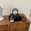 Bolso tote casual y elegante, nueva colección principios de otoño 2026, bolso de hombro estilo Boston de gran capacidad para el trabajo y los desplazamientos