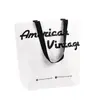 Bolsa de palha tecida portátil de PP personalizada para publicidade, presente de aniversário, sacola de compras, sacola de compras de comércio exterior com letras