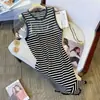 Vestido chaleco nuevo a rayas de seda helada sin mangas moda coreana verano holgado talla grande adelgazante borla vestido largo