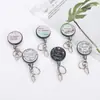 Chaveiro retrátil artístico para atacado de fabricantes, chaveiro retrátil redondo com diamantes completos, porta-crachá criativo, porta-crachá de identificação