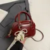 Bolso tipo almohada de moda casual para mujer, bolso cruzado simple y versátil, nuevo bolso de hombro de color liso para la primavera 2026