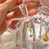 Diseño Color Dopamina Abalorios Lazo Estrella Colgante Dulce Arcoíris Cadena para Teléfono Llavero Ins