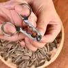 Pinzas Caseras de Acero Inoxidable para Pelar Semillas de Girasol, Cáscaras de Cacahuete y Piñones - una Herramienta para Personas Perezosas