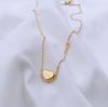 Collar con colgante de llave de corazón de melocotón de acero de titanio con sonido explosivo de red, color nuevo, para mujer, venta al por mayor