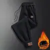 Pantalones de hombre con forro polar transfronterizos, pantalones largos engrosados para otoño e invierno, pantalones jogger cálidos, pantalones casuales holgados y versátiles