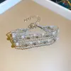 [Cadena de Diamantes Arcoíris] Pulsera de extracción de zircón trenzado en cruz, una pulsera lujosa y de alta gama, una pieza de joyería delicada y de moda