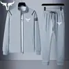 Conjunto de Dos Piezas de Sudadera y Pantalón de Chándal de Color Sólido Estampado de Venta Caliente Europea y Americana, Nuevo Traje Deportivo Casual para Pareja para Primavera y Otoño