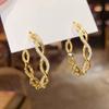 Cao Shi aretes de aro grande con línea de onda para mujer aretes de tendencia de moda explosiva para mujer aretes con diseño de incrustaciones explosivas