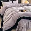 Juego de cuatro piezas de terciopelo de leche bordado de lujo ligero estilo francés, apto para la piel, cálido, franela engrosada, ropa de cama para dormitorio