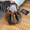 2025 Nuevo Bolso Cubo Grande con Cierre de Cordón para Mujeres Presbitas Bolso de Hombro Cruzado Portátil de Gama Alta Bolso Femenino Transfronterizo