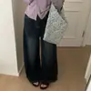 Foto real dos novos jeans de outono 2026 coreanos Dongdaemun femininos de alta costura, lavados, de perna larga e emagrecedores