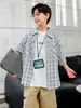 Nueva Camisa de Manga Corta de Algodón Puro Estilo Preppy de Verano 2025 para Niños Camisa a Cuadros de Media Manga para Niños Panda Yuan Yuan