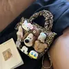 Bolsa de Crowdsourcing Avançada Sense para Multidões Pequenas Feminina Outono e Inverno 2024 Nova Moda Bolsa Transversal para Dor Bolsa Balde Portátil de Desenho Animado Fofo