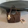 Bolsa tote plissada de nicho estilo coreano para mulheres, novo modelo outono 2026, bolsa de grande capacidade para estudantes universitários, bolsa de ombro para o dia a dia