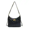 Bolsa de mão preta pequena estilo Chanel para mulheres, nova moda 2026 nicho de alta qualidade bolsa de ombro com padrão de diamante e alça de corrente