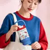 La nueva taza térmica portátil de gran capacidad de Hello Kitty de Sanrio es linda y conveniente para llevar, con un alto atractivo estético para las niñas, y cuenta con un diseño de doble sorbo.