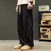 Calças finas masculinas de outono, estilo japonês moderno, calças casuais retas cinza de peso médio com bom caimento, adequadas para primavera e outono