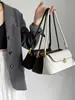 Bolsa de Mão de Nicho Francês Feminina 2025 Nova Moda Retro Bolsa de Ombro Bolsa Bagel Bolsa de Ombro Média Antiga