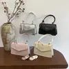 Bolsa de mão de cor sólida da moda transfronteiriça bolsa quadrada pequena elegante de alta qualidade nova chegada da estação atual bolsa versátil de nicho para o dia a dia bolsa feminina