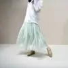 Saia de Gaze com Brilho de Seda Estilo Novo 2026 para Mulheres Primavera e Verão Brilho Metálico Saia Evasê Emagrecimento e Fluidez Comprimento Médio Estilo Elegante