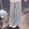 2026 primavera y otoño nuevos estilos pantalones casuales lisos simples para niñas conjunto versátil de dos piezas con top de solapa a cuadros y retazos