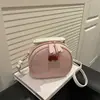 Bolso de Hombro Cruzado Lindo Versátil Simple de Moda Nueva Primavera 2026 Bloqueo de Color Patrón de Lichi de Moda Cereza