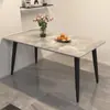 Mesa de comedor de mármol estilo nórdico, un juego de mesa y sillas de comedor para uso doméstico, con un diseño simple, moderno y lujoso, adecuado para apartamentos pequeños, con tablero rectangular