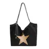 Tendência transfronteiriça bolsa tote de mão nova feminina bolsa 2026 outono nova estrela bolsa de ombro única estilosa bolsa de axila da moda