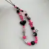 Cadena para teléfono móvil casera de nicho rosa negro estilo dulce fresco cordón ccd colgante retro para teléfono móvil dulce y picante colgante ccd