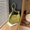 Moderna Bolso Cubo Grande Nuevo para Mujer 2026 Estilo Coreano Hueco Bolso de Hombro Único Versátil Bolso Cruzado para el Viaje Diario