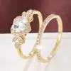Set de anillos de lujo TEMU de venta caliente transfronteriza con microincrustaciones de circonita, set de anillos de boda de moda europea y americana para mujer, venta directa del fabricante