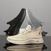 En Stock Venta al por Mayor Primavera Nuevos Modelos Zapatos Casuales de Tejido de Punto para Hombre, Tenis de Moda Versátiles de Moda, Zapatos Ligeros para Correr
