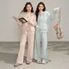 Conjunto de Suéter Cardigan com Capuz e Zíper Venda Quente Transfronteiriça para Mulheres Outono Inverno Novo Tricô Solto Calça Longa de Perna Larga Conjunto de Duas Peças
