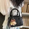 Bolsa de almohada transfronteriza para mujer 2026 Nuevo estilo Moda Popular Temperamento Bolsa de boliche Elegante Bolso de mano para hombro Cruzado Moderno