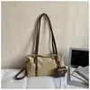 Bolso de hombro retro con acabado mate para mujer, nuevo estilo 2026, versátil para ir al trabajo, bolso bandolera de moda, bolso elegante para debajo del brazo, bolso baguette con un toque de alta gama