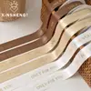 Nuevo Producto de CintaCinta de Poliéster Doble Cara con Estampado Dorado en Inglés Xinyou - Cinta de Satén Floral de Alta Calidad para Ramos de Flores y Regalos
