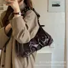 Bolso de nicho para el día a día de gran capacidad con lazo plisado, bolso nube de un solo hombro para mujer, nuevo bolso de moda 2026 para el antebrazo