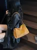2026 Nuevo Bolso de Hombro Único de Gamuza Retro para Mujer Bolso de Cadena para Axila Estilo Coreano Bolso Suave para Viajes Diarios Bolso Cruzado de Gran Capacidad