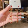 Pendientes de lazo de terciopelo rojo con ambiente de moda, temperamento femenino, flor dulce, borla larga, pendientes Joker al por mayor