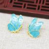 Yiwu color rayo dorado cobre chapado en oro DIY punto esmeralda imitación oro esmalte azul ardiente pequeño pendiente de mariposa B3383