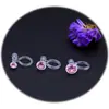 Clip para oreja pequeño japonés transparente con incrustaciones de circonita, aretes de resina transparente para protección del medio ambiente, fabricantes de joyería popular callejera de Internet al por mayor