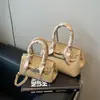 Bolso Platino de Gran Capacidad Bolso de Mujer Patrón Granulado Simple Elegante Bolso de Hombro Estilo Extranjero Versátil Cerradura Bolso Cruzado Portátil