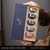 Juego de tazas de té Jianzhan de cerámica de alta gama con incrustaciones de oro y detalles de jade, un juego de tazas maestras premium doradas para té Kung Fu